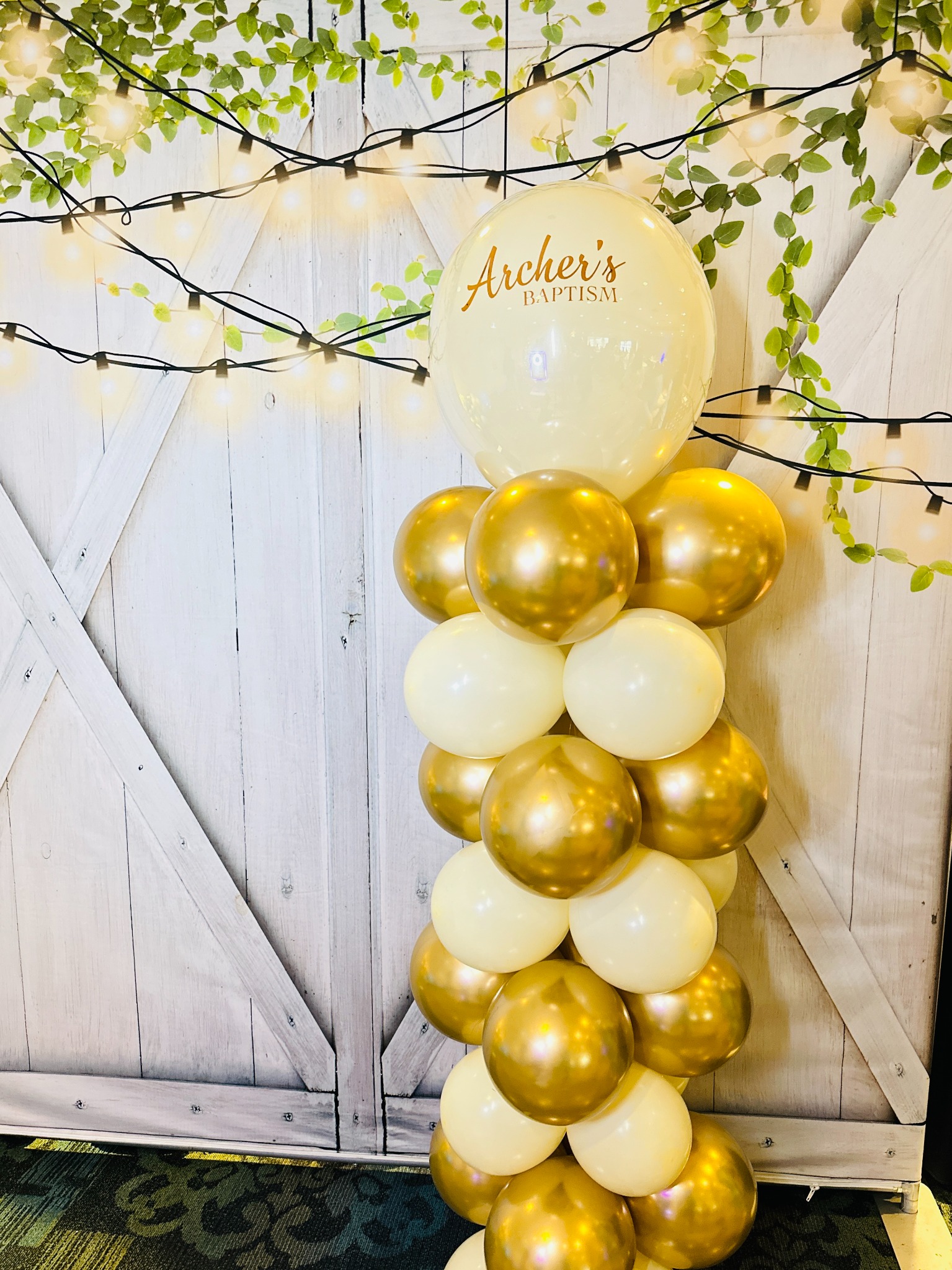 Personalized cream and gold baptism balloon column
